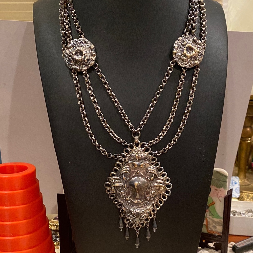 Victorian-Art Nouveau Festoon Style With Large Repousse’.